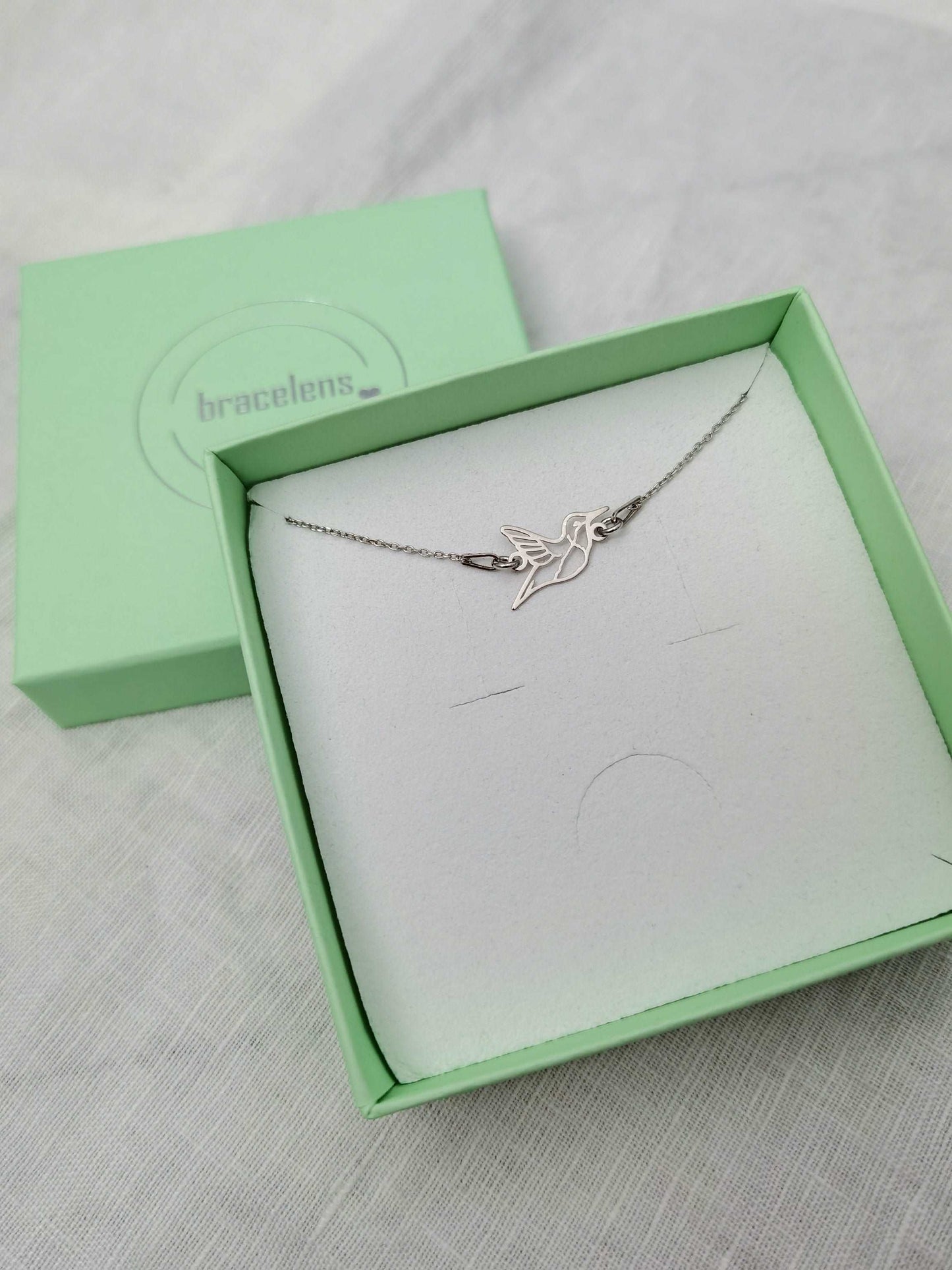 Silbernes Kolibri Armband in mintgrüner Schmuckschachtel