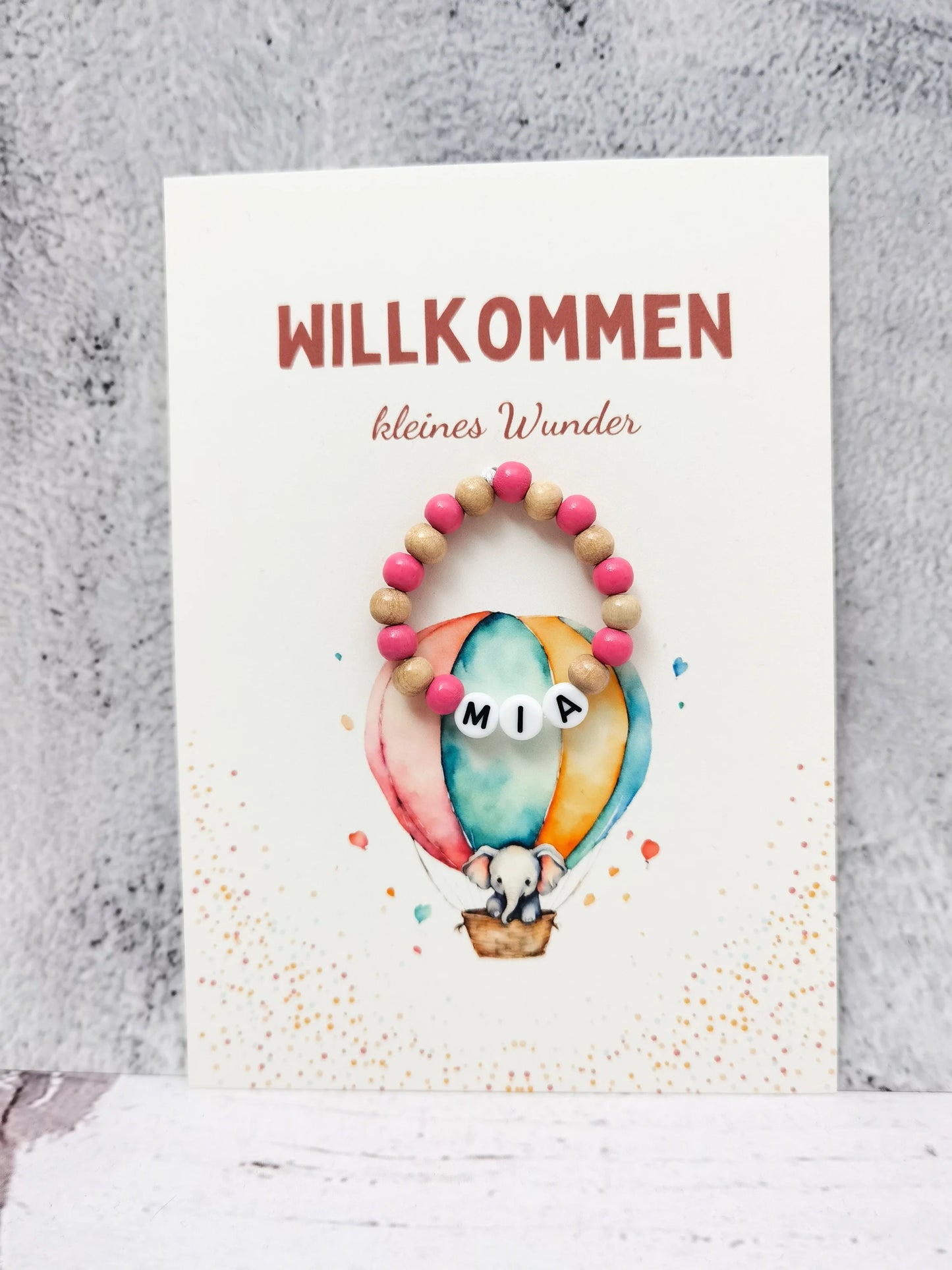 Postkarte "Willkommen kleines Wunder" zur Geburt mit Babyarmband in Wunschfarbe