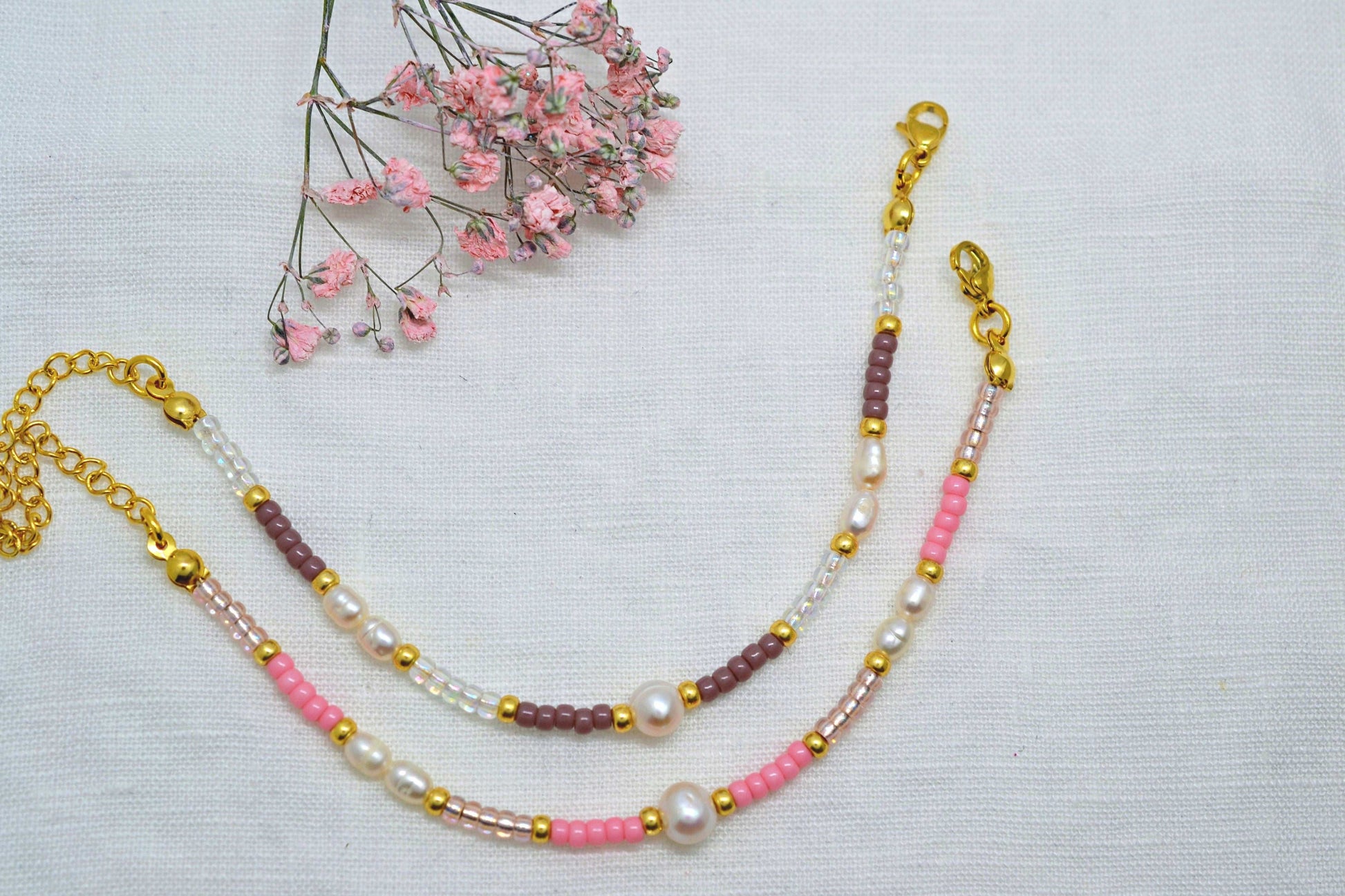 Perlenarmband in rosa und lila mit Süßwasserperlen
